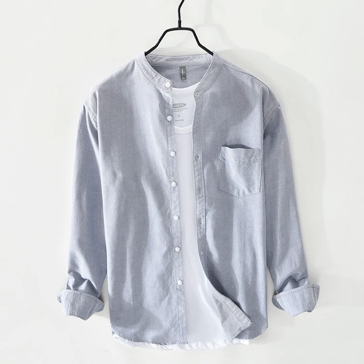 Professional man in a Beaumont Classic Casual Shirt, styled for smart business casual men's attire.