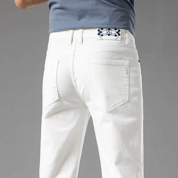 Men's Aven blue slim-fit stretch jeans for modern comfort & style. Perfect casual denim.