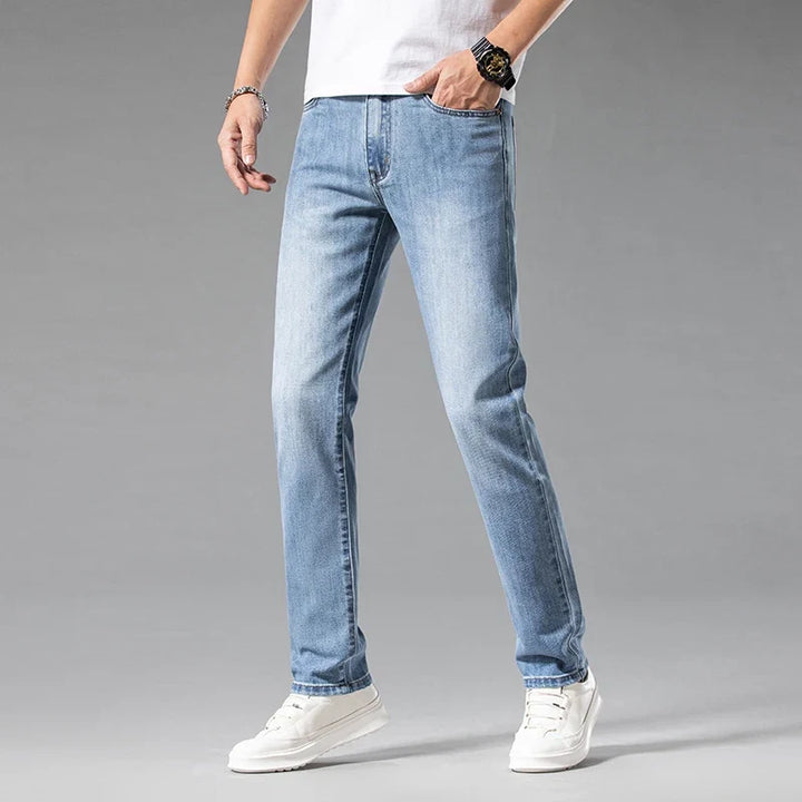Versatile men's Aven slim-fit stretch jeans. Blue denim for a modern, comfortable casual look.