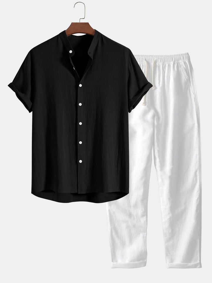Black men's two-piece co-ord set. Slim fit linen short sleeve top & ankle pants. Modern men's fashion for smart casual look.