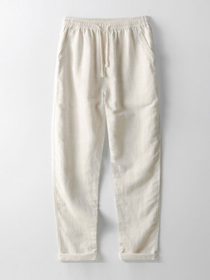 Black men's slim fit linen ankle pants, perfect for a smart casual co-ord set. Modern and comfortable.