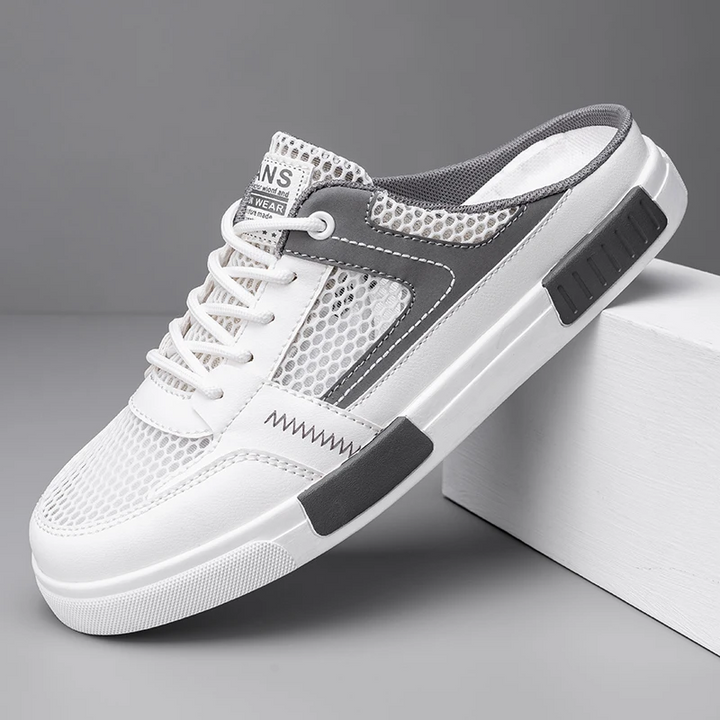 Side profile of Belarmino men's comfort shoes, featuring a modern slip-on sneaker slide design.