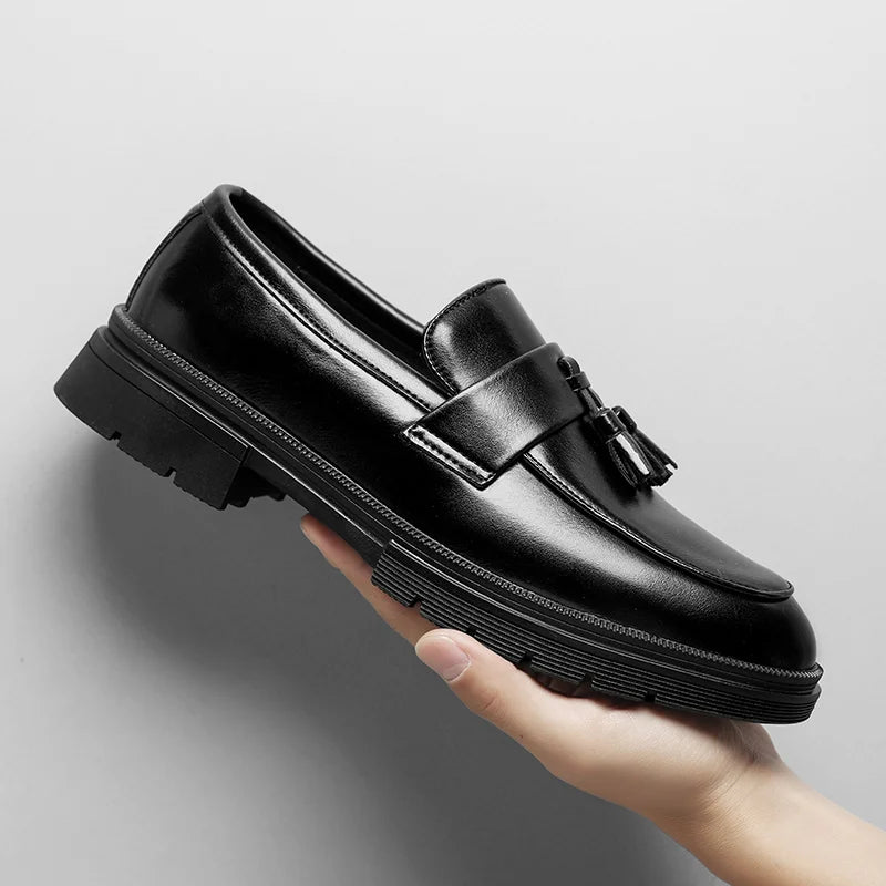Sophisticated men's footwear: Polished Belmont tassel loafers, ideal for formal and business casual.