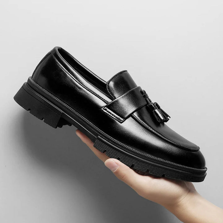 Sophisticated men's footwear: Polished Belmont tassel loafers, ideal for formal and business casual.