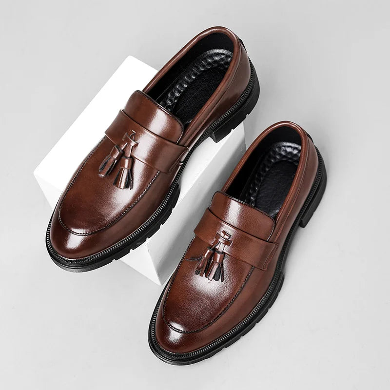 Men's fashion essential: Polished Belmont tassel loafers, versatile for dress shoes or sophisticated business casual.