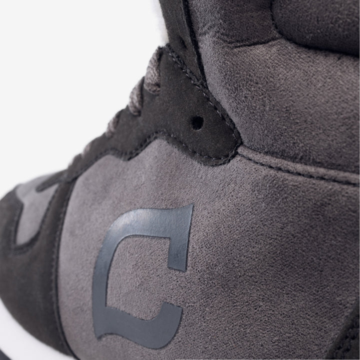 Bjorn men's protective snow boots, offering warmth, water-repellency, & anti-slip grip on icy surfaces.