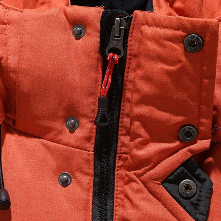 Stylish & durable men's winter jacket, insulated for extreme cold, essential waterproof outdoor wear.