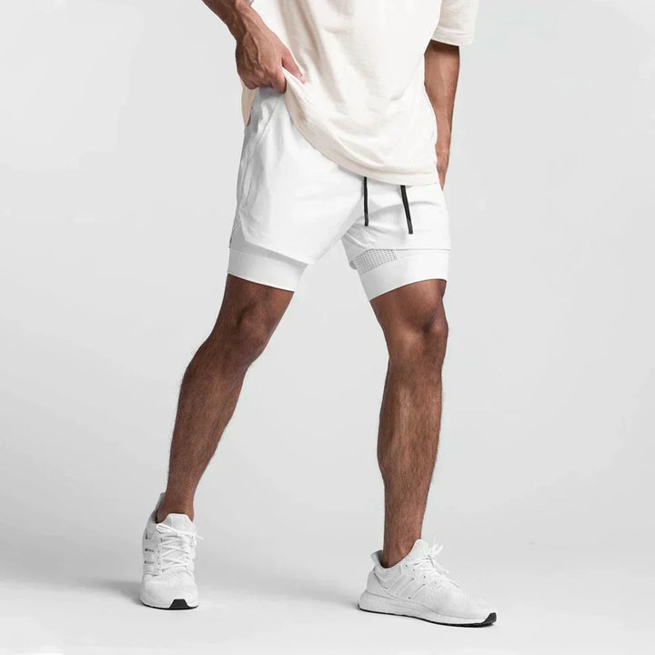 Detail of the elastic waistband and drawstring on men's workout shorts, for a secure fit