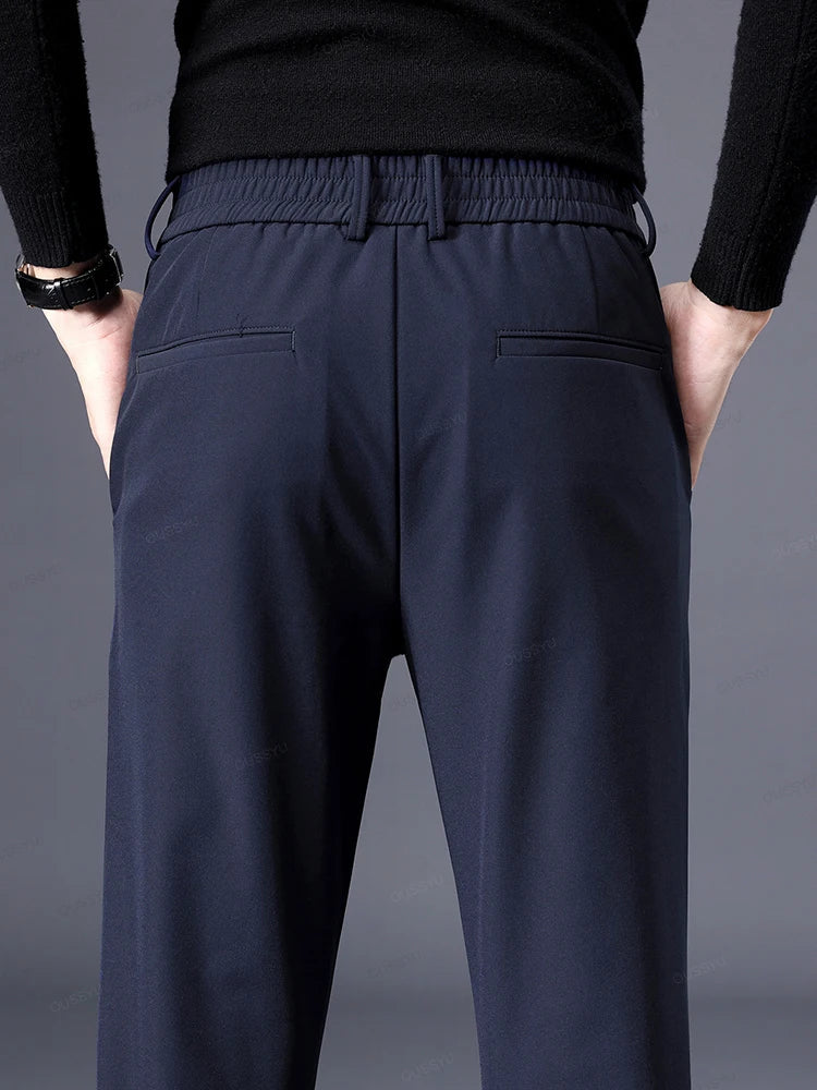 Comfortable men's classic fit pants with elastic waist, offering versatile style for everyday wear.