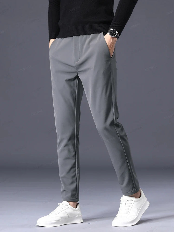 Versatile men's classic fit pants, easily styled as dress pants or casual wear for any occasion.