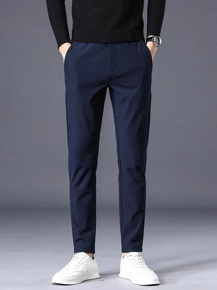 Black men's comfort pants, classic fit with elastic waist for versatile, everyday styling.