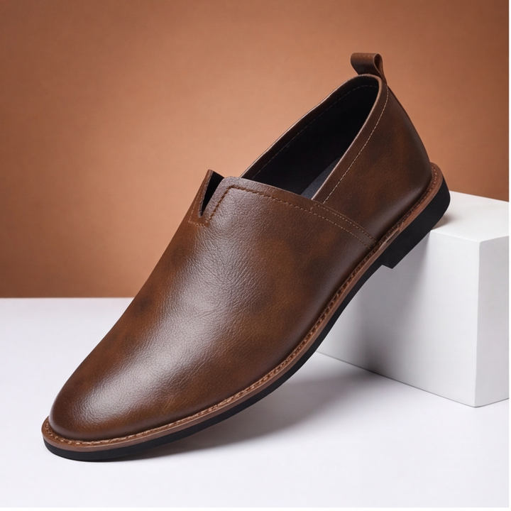Men's black classic slip-on loafers, comfortable & sleek for everyday wear.