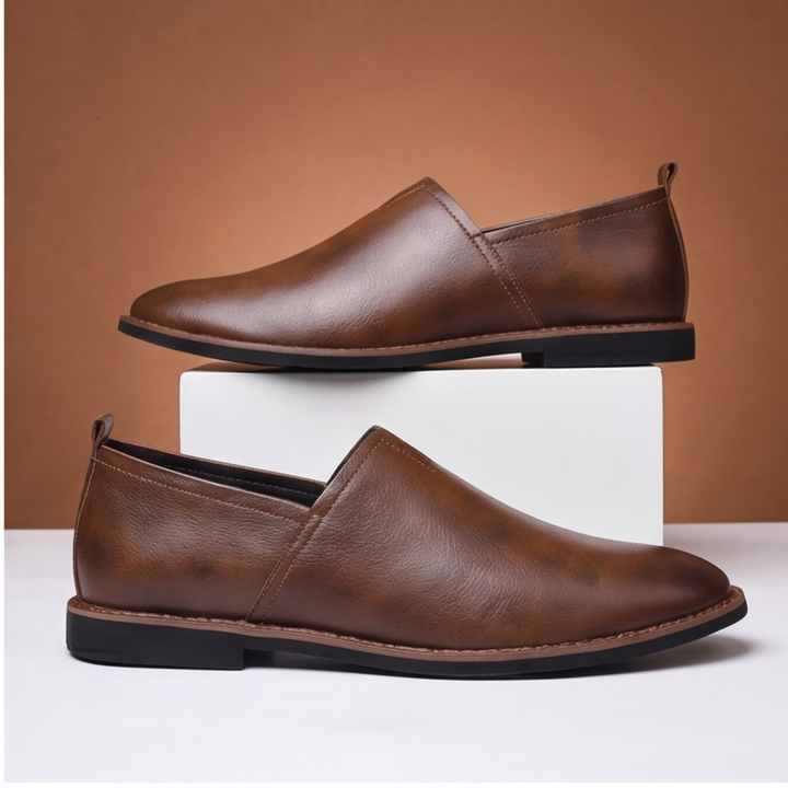 Brown men's slip-on loafers, versatile footwear with classic style & comfort.