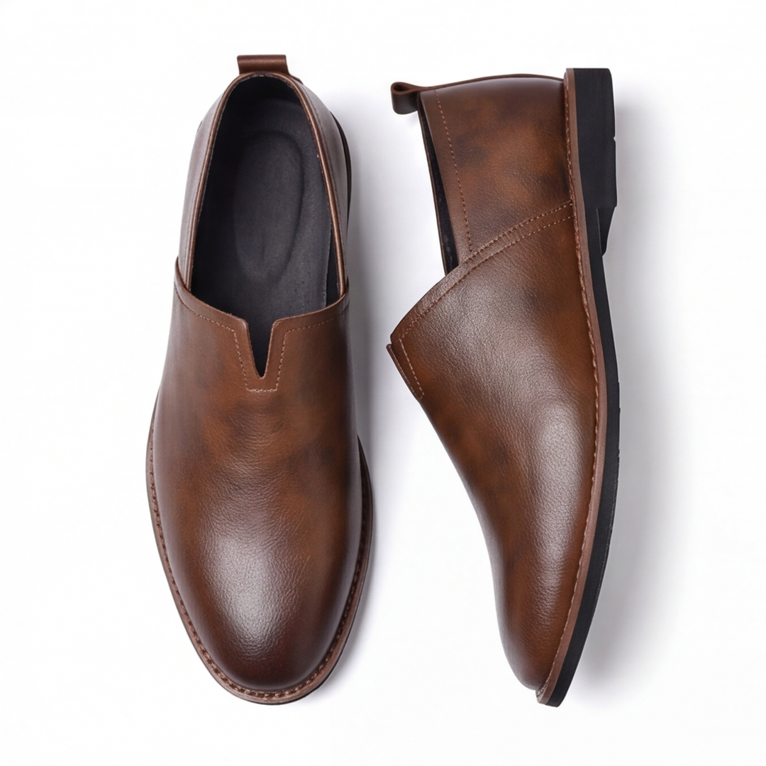 Side view of men's slip-on loafers, classic design, comfortable, versatile footwear.