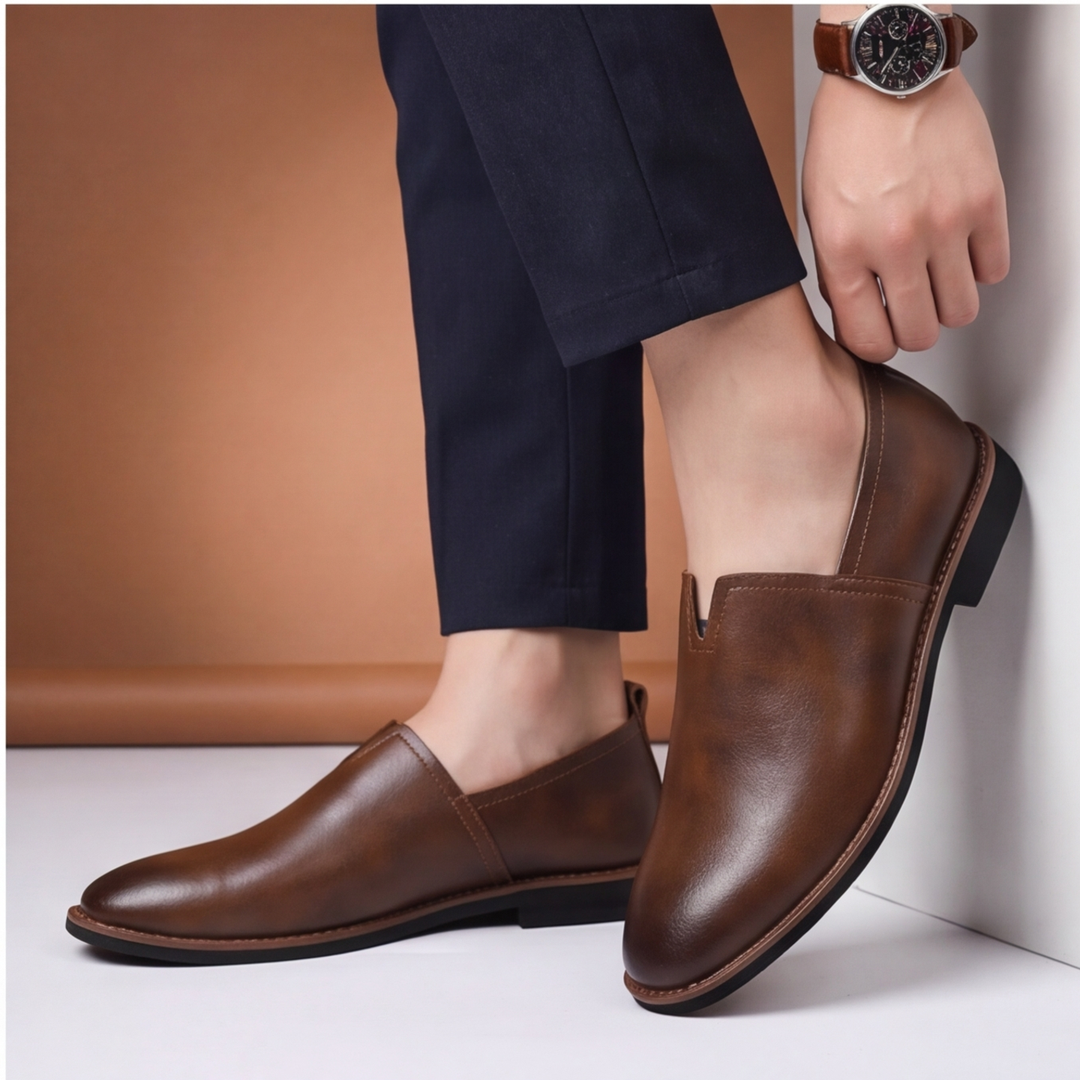 Top view of sleek men's slip-on loafers, ideal for casual, dress, & everyday style.