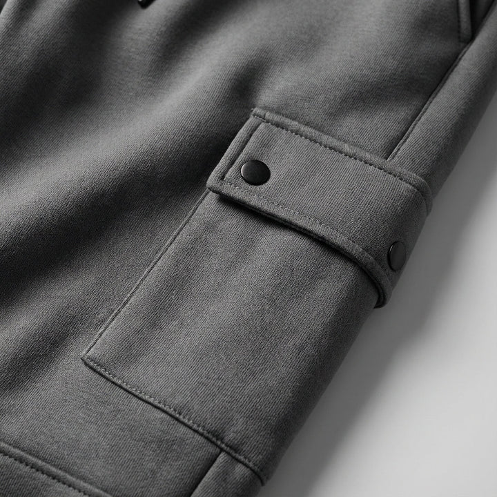Close-up of men's cropped cargo trousers showcasing pocket detail and durable fabric
