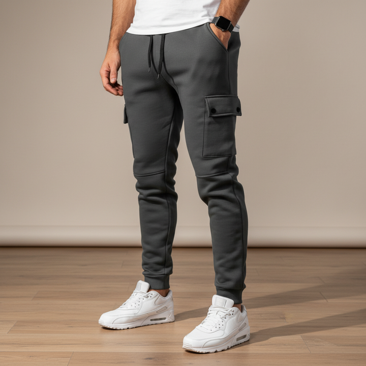 Men's black cropped joggers with side pocket, perfect for active comfort & athleisure style.