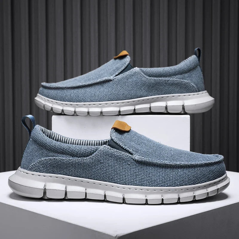 Men's black effortless slip-on comfort shoes for everyday wear.
