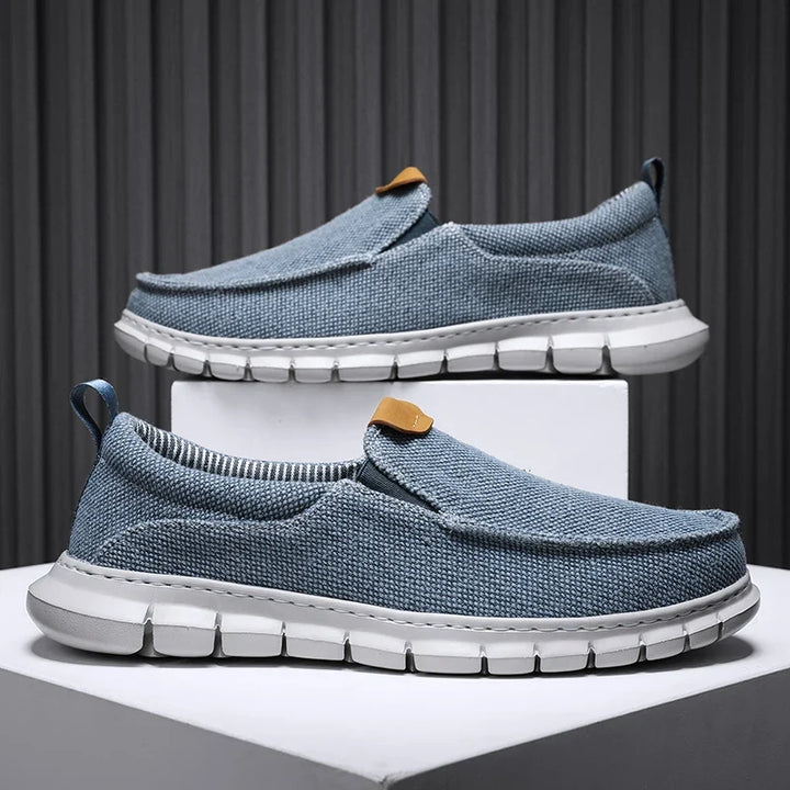 Men's black effortless slip-on comfort shoes for everyday wear.