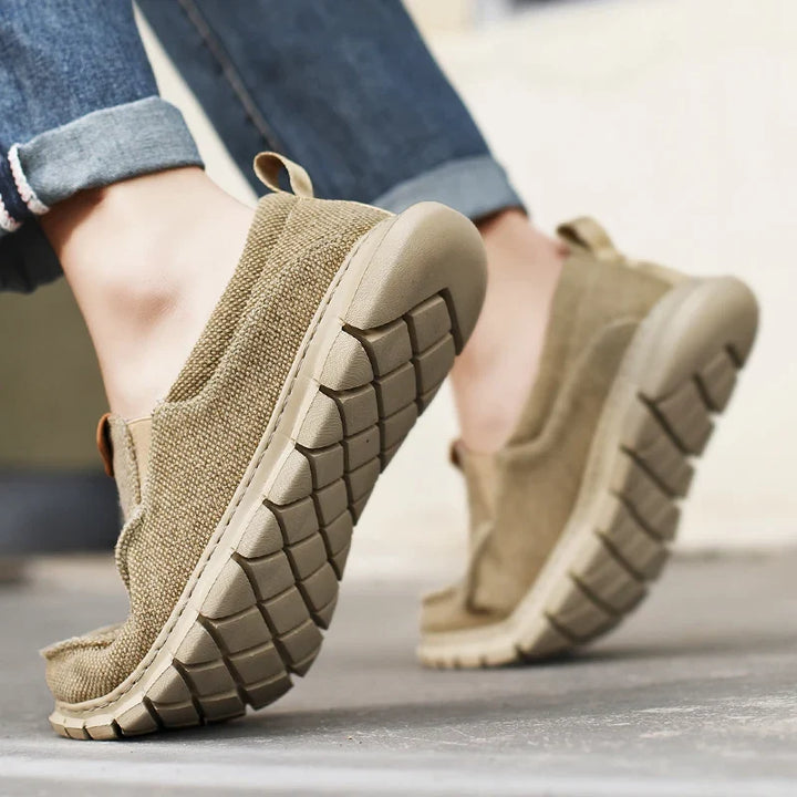 Comfortable men's slip-on footwear, designed for effortless everyday wear and versatile style.