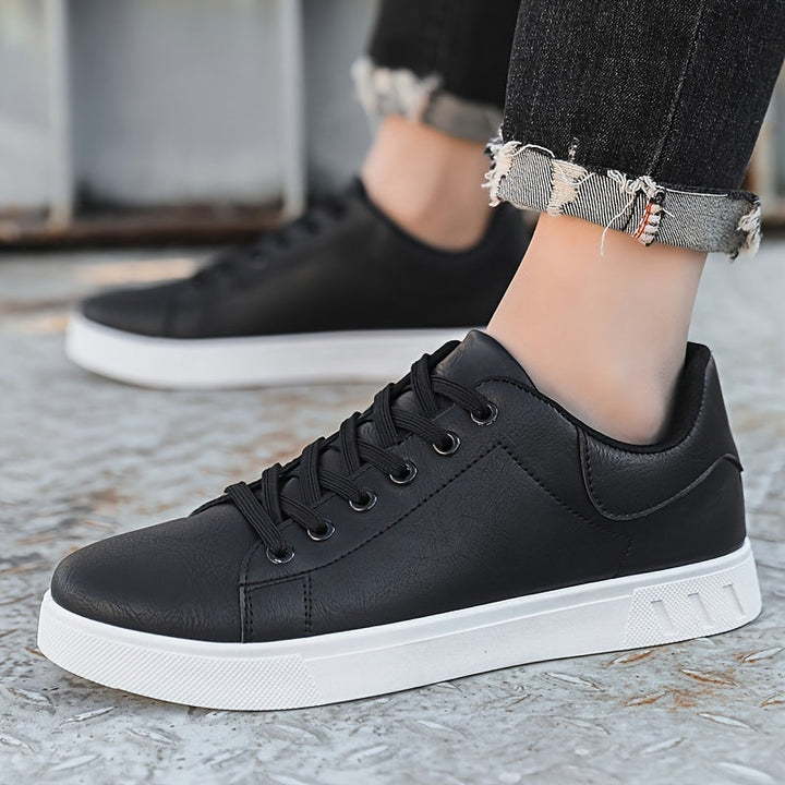 Slip-resistant white men's footwear, comfortable and durable for daily active use.