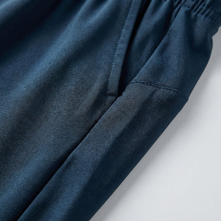 Close-up of the drawstring waist on Vince men's flexible training joggers, perfect for casual pants.
