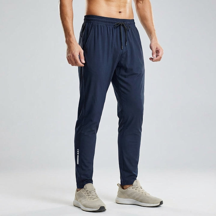 Full-length view of men's flexible training joggers by Vince, designed for comfort and movement.