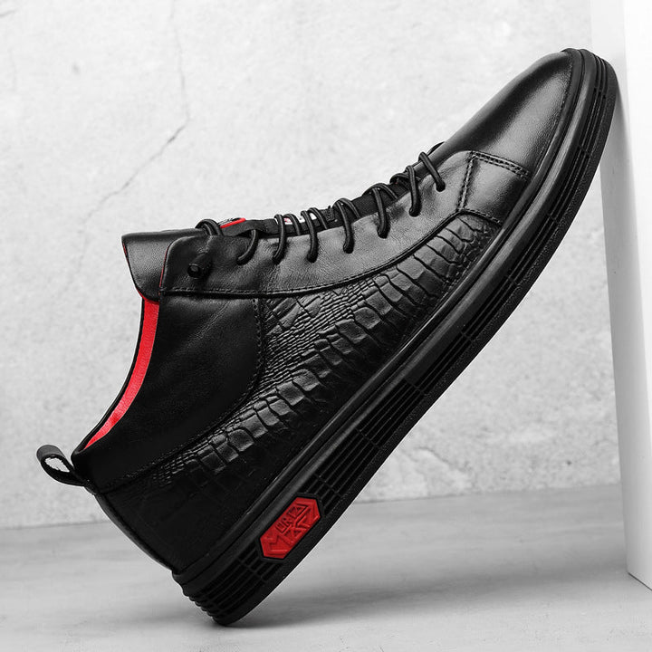 Premium men's black high-top sneakers, featuring sharp red details, perfect for modern and comfortable street style.