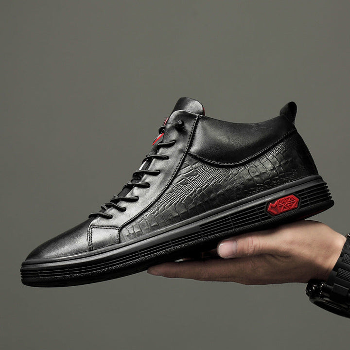 Front view of men's black high-top shoes with red lace-up design, perfect for a casual, athletic look.
