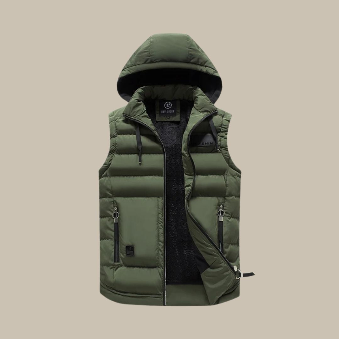 Close-up of men's insulated puffer vest fabric, showcasing horizontal baffles and a cozy hooded design.