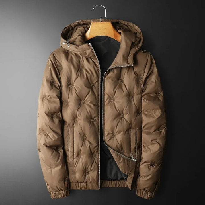 Men's black insulated puffer jacket for winter warmth. Cozy quilted outerwear for cold weather.