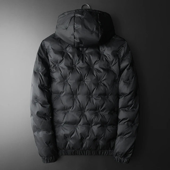 Warm men's black quilted puffer jacket, ideal insulated outerwear for harsh winter weather.