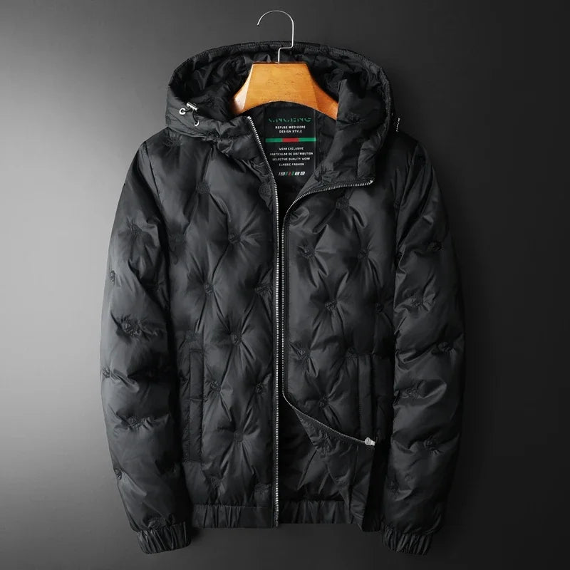 Durable men's black insulated puffer jacket, offering superior warmth. Quilted winter fashion for men.