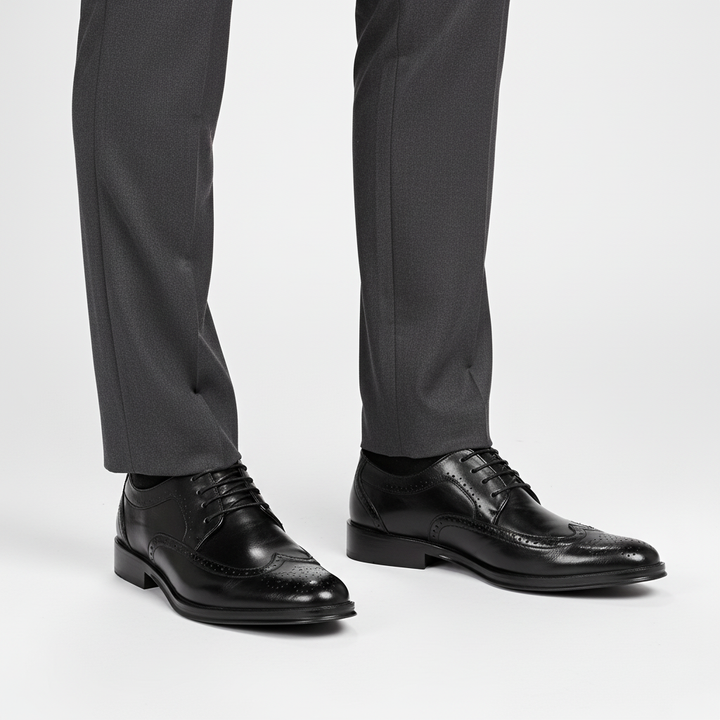 Close-up of the pointed toe and lustrous Italian leather on men's dress shoes, high-quality formal footwear