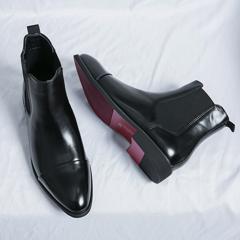 Stylish formal men's boots: black Chelsea with elastic side panels and eye-catching red sole detail.