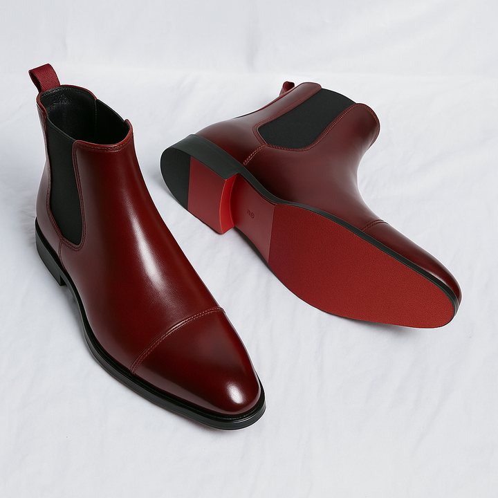 Versatile men's ankle boots: brown Chelsea style with comfortable fit and a bold red sole for flair.