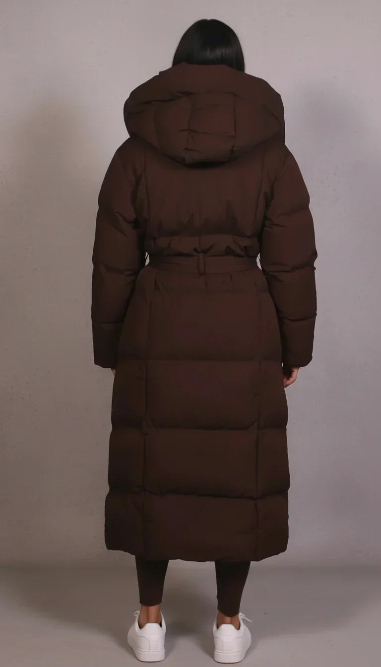 Fashionable men's warm longline puffer coat for extreme cold, featuring a sleek, modern design.