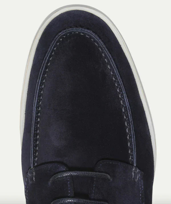 Side view of elegant men's beige leather lace-up loafers, comfortable formal footwear for men.