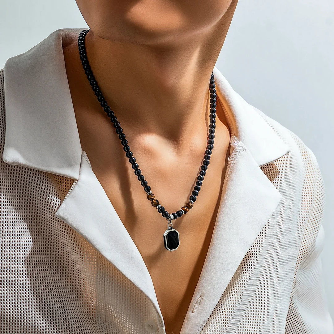 Black Onyx men's beaded necklace with Tiger's Eye accents, a versatile men's fashion & jewelry piece.