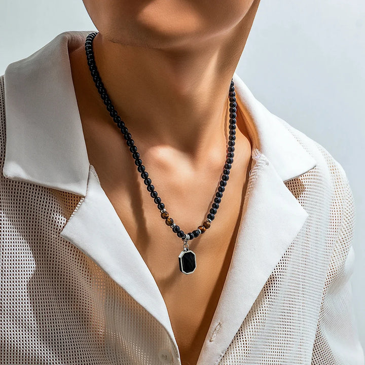 Black Onyx men's beaded necklace with Tiger's Eye accents, a versatile men's fashion & jewelry piece.