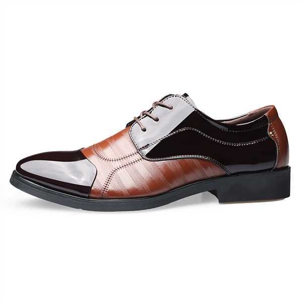 Stylish men's black patent oxford dress shoes worn with a suit, completing a sophisticated business attire look.