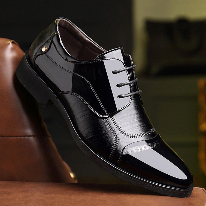 Black patent oxford dress shoes, designed for men seeking elegant, cushioned comfort in classic formal footwear.