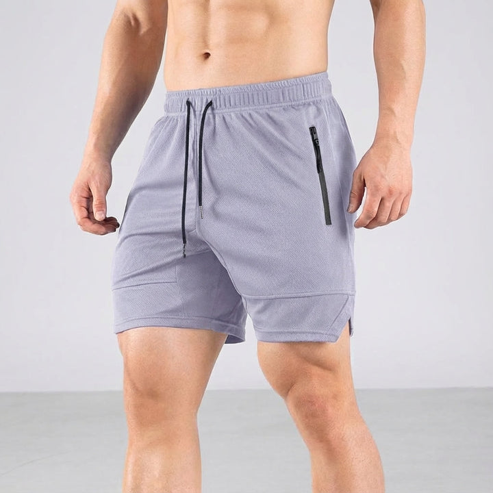 Polyester men's shorts with pockets, suitable for gym, running, and everyday casual wear