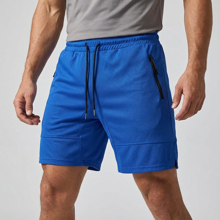Men's quick-dry fitness shorts, black, featuring a secure zipper pocket, designed for athletic performance.