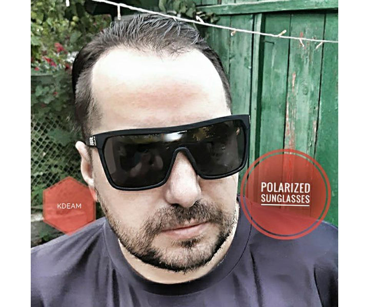 Model wearing men's flexible polarized sunglasses, ideal for sport & UV400 protection