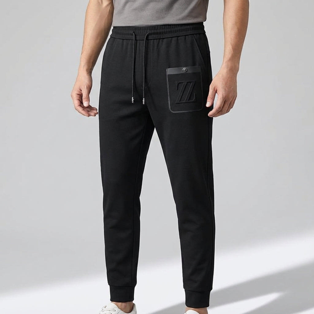Sporty men's black jogging trousers, Felix, featuring a comfortable fit for athletic or casual wear
