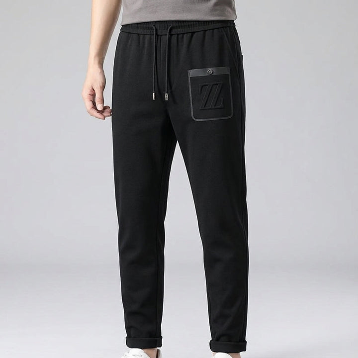 Casual men's black jogger trousers, Felix, offering comfort and style for leisure or everyday activities
