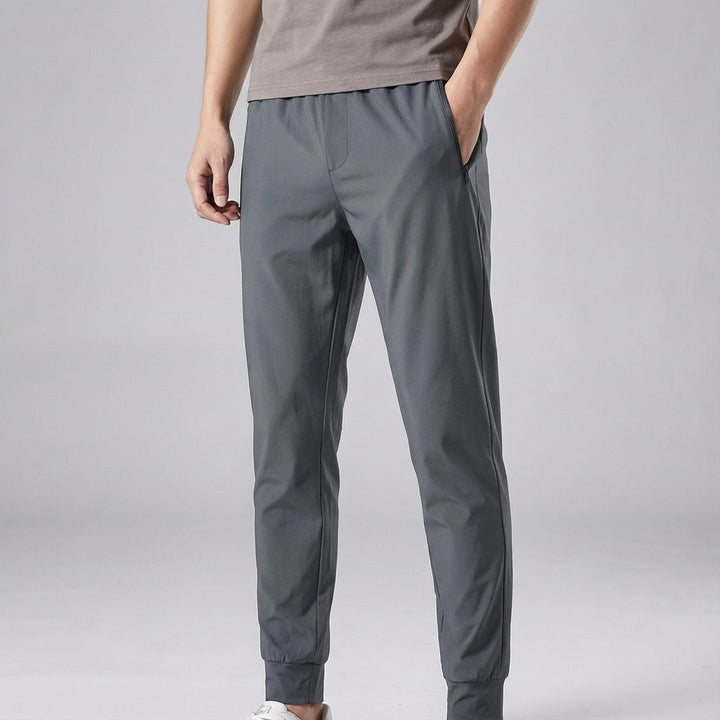 Durable nylon spandex men's sports trousers, Phillip design, offering comfort and flexibility for active use.