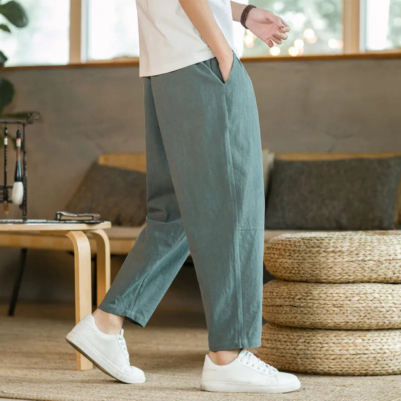 Stylish men's olive relaxed fit casual drawstring pants. Comfortable, versatile, and perfect for everyday wear.