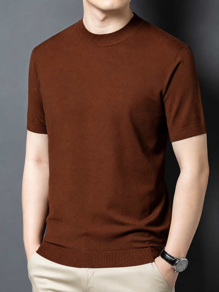 Navy men's short sleeve tee; slim fit with a comfortable mock neck for everyday style.